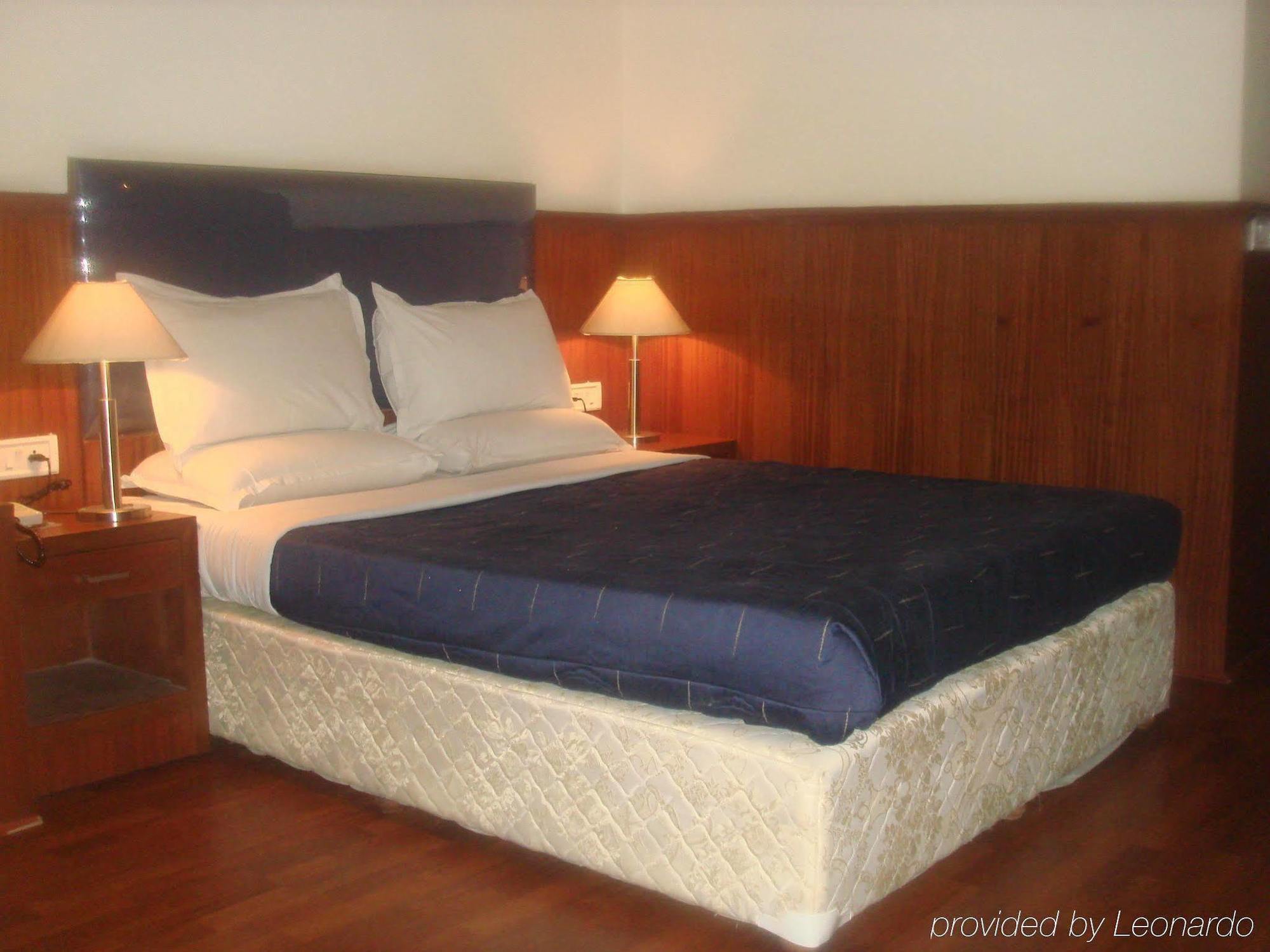 Hotel Noor Empire International Kormangala Бенґалуру Номер фото